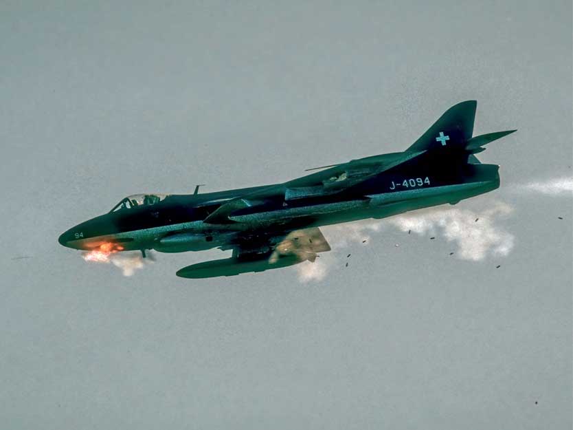 Muzzles blazing, ejected cartridge cases clattering: a Hunter fires its ADEN